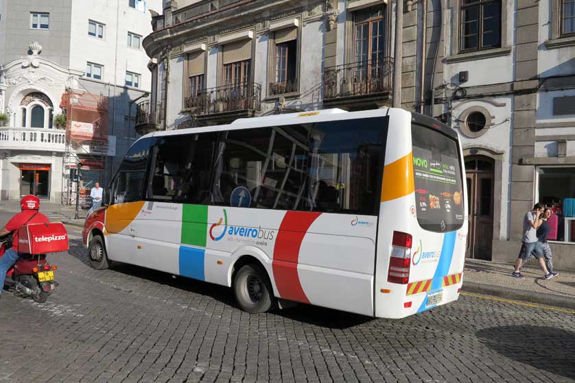 Local buses have a multi-color livery.