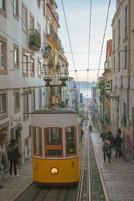 The Bica elevador with the River Tagus in the background.