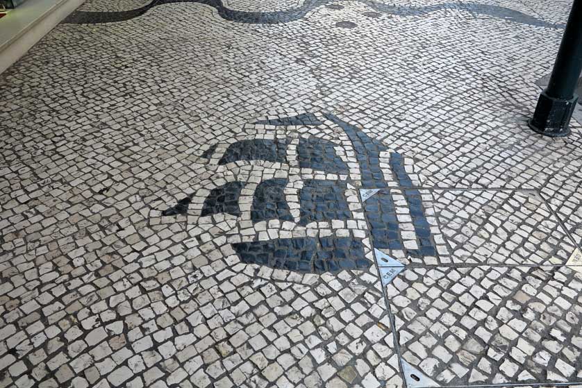 There is a ship motif on this pavement.
