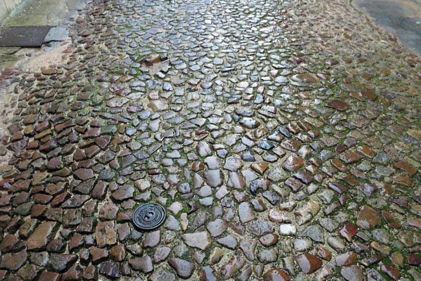 Wet calçada pavement, Coimbra.