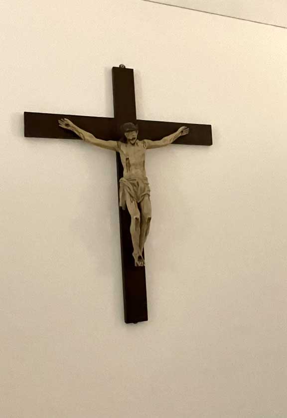 A crucifix showing the Corpus or body of Christ.