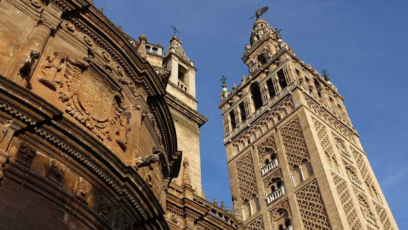 The Giralda (left) and Cathedral (right).
