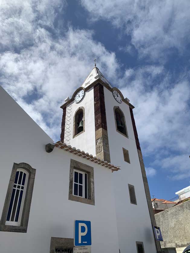 The bell tower has four clocks.