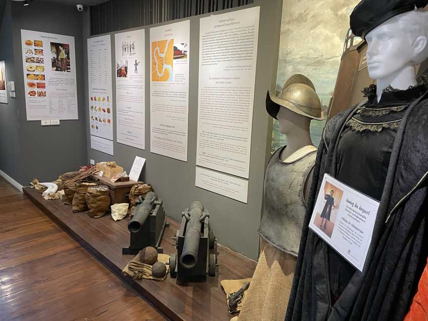 Exhibits at the museum including uniforms and weapons.