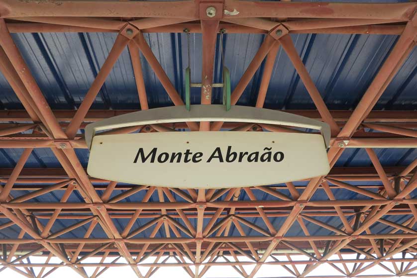 Station sign on the platform.