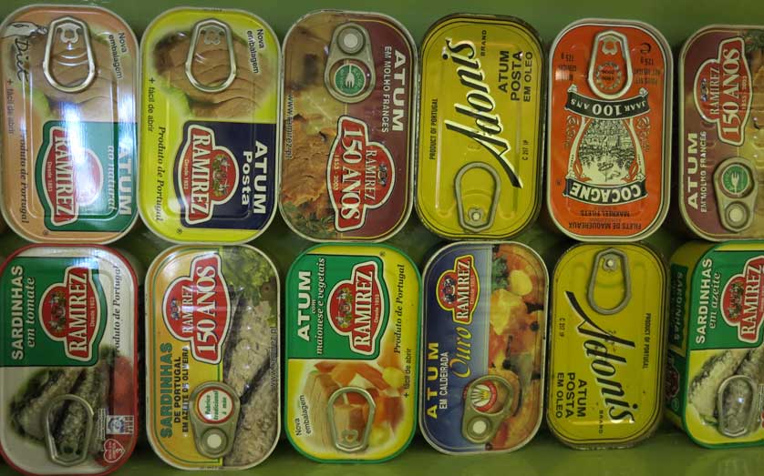 Designs for sardine cans on display.