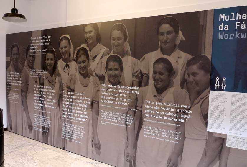 Wall panel with quotes from women who once worked in the factory.