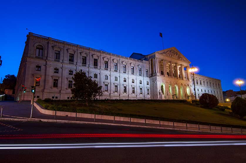 The parliament building at night.