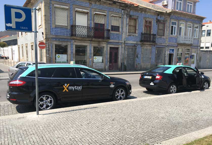Taxis waiting outside the station.