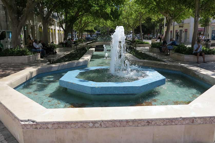 Trees and fountains provide welcome cool in the summer.