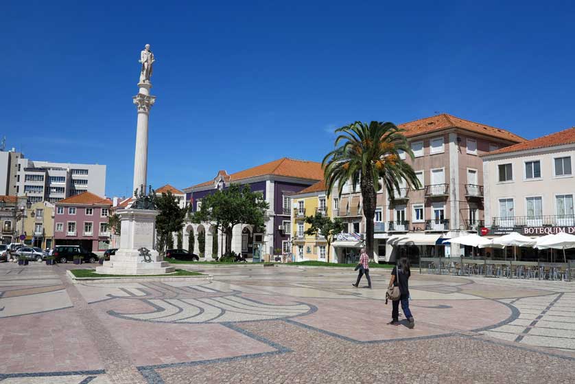 Pavement cafes surround the square.