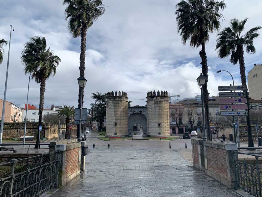 Looking back at the monument from the Puente de Palmas bridge.