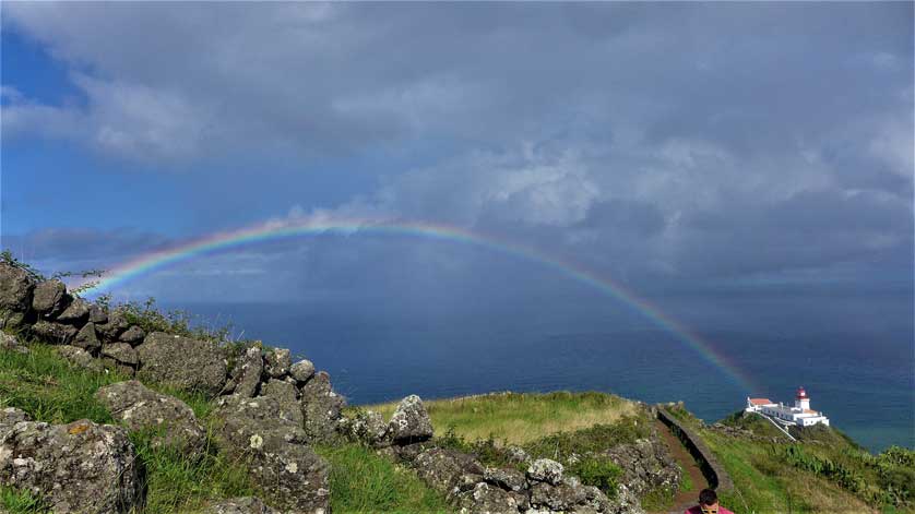 Lighthouse and rainbow, Santa Maria, Azores, Portugal.