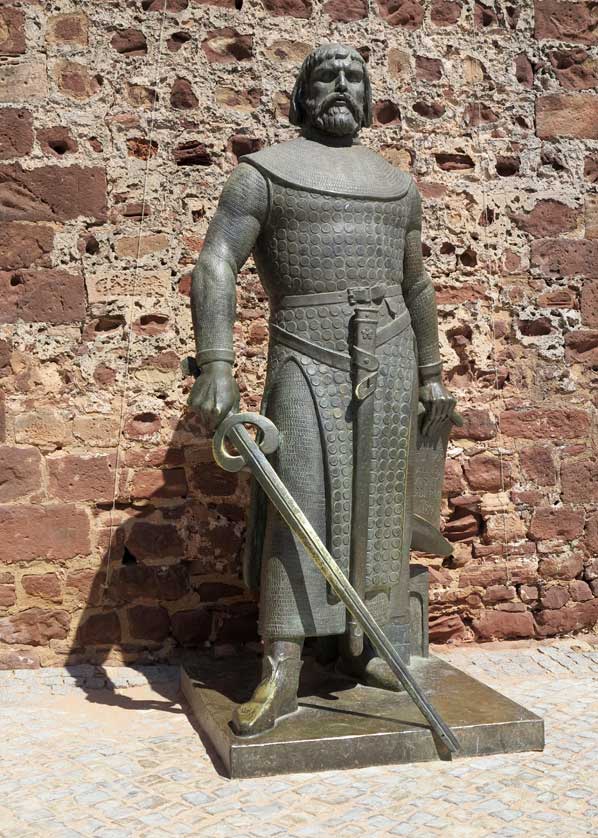 Statue of King Sancho I outside the entrance to Silves Castle, Silves, Algarve, Portugal.